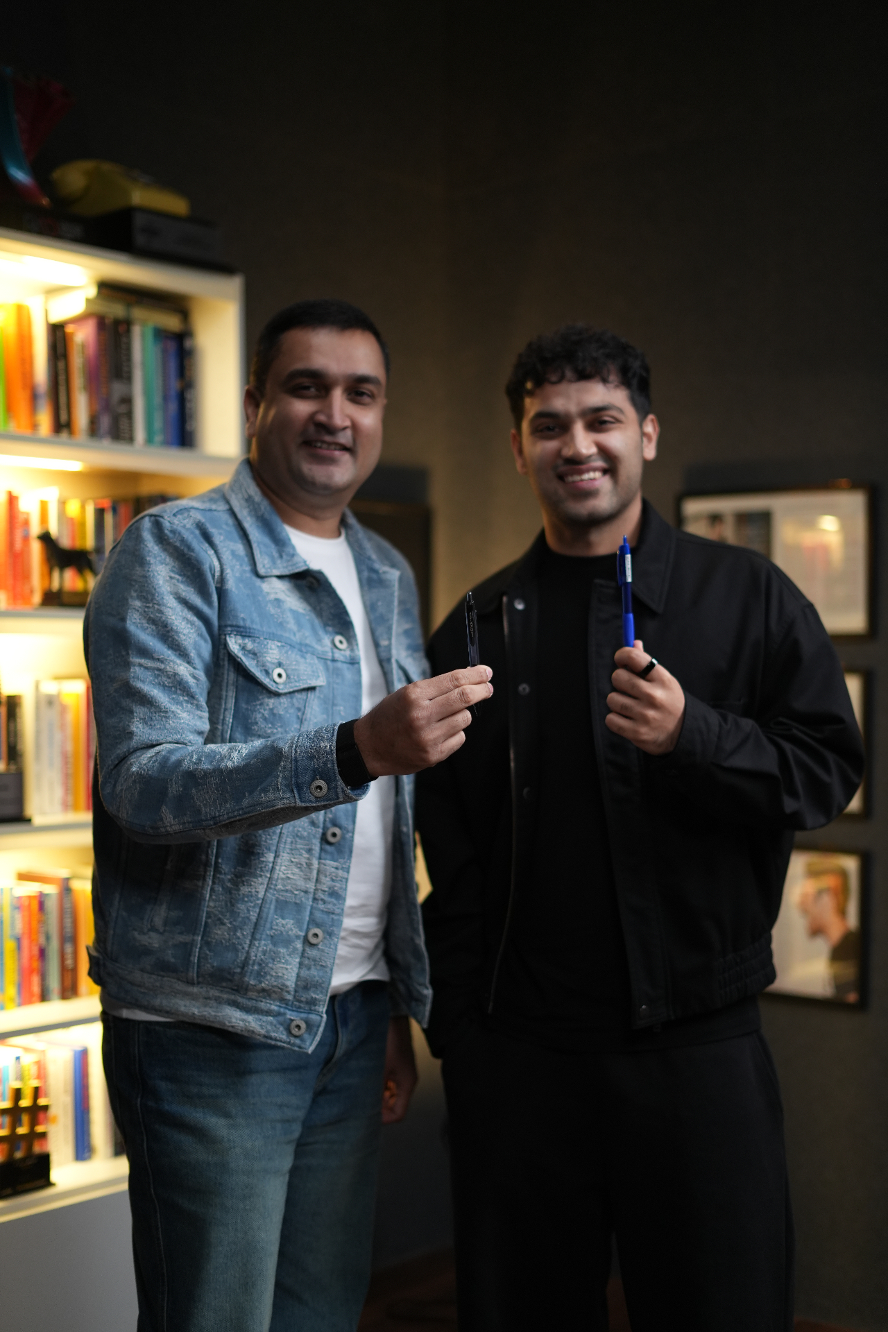 Imran Baig with Raj Shamani holding pens